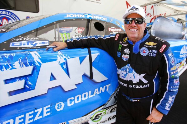 FILE - Funny Car driver John Force looks to get back on track for the last day of qualifying at the NHRA Kansas Nationals at Heartland Park, May 21, 2016, in Topeka Kansas. (Chris Neal/The Topeka Capital-Journal via AP, File)