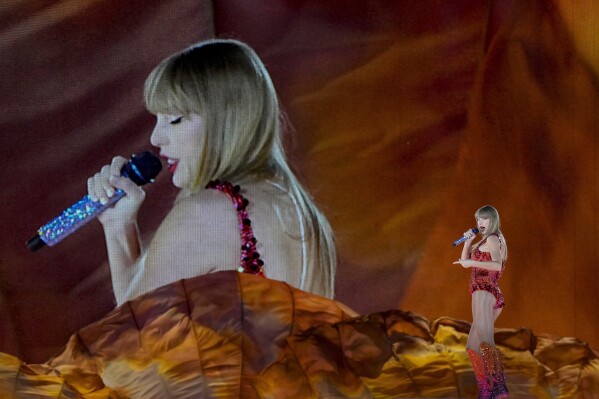 Taylor Swift performs at the Paris Le Defense Arena as a part of her Eras Tour concert in Paris, Thursday, May 9, 2024. (AP Photo/Lewis Joly)