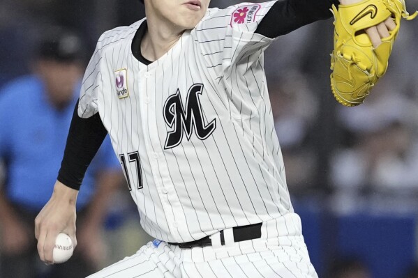 Chiba Lotte Marines pitcher Roki Sasaki throws against the Fukuoka SoftBank Hawks in a baseball game in Chiba, near Tokyo, Friday, Aug. 30, 2024. (Kyodo News via AP)