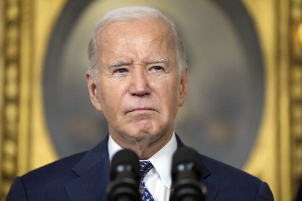 FILE - President Joe Biden speaks in the Diplomatic Reception Room of the White House, Feb. 8, 2024, in Washington. President Joe Biden dropped out of the 2024 race for the White House on Sunday, July 21, ending his bid for reelection following a disastrous debate with Donald Trump that raised doubts about his fitness for office just four months before the election. (AP Photo/Evan Vucci, File)