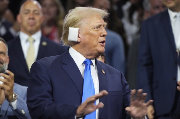 Republican presidential candidate former President Donald Trump is introduced during the Republican National Convention Tuesday, July 16, 2024, in Milwaukee. (AP Photo/Paul Sancya)