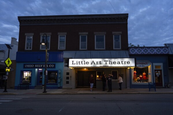 The Littel Art Theatre is seen after the 7 p.m. showing of Raising Arizona on Thursday, May 16, 2024, in Yellow Springs, Ohio. When the Little Art Theatre set out to land a $100,000 grant to fund a stylish new marquee, the cozy arthouse theater had some talented help. Oscar-winning documentarian Steve Bognar lives in Yellow Springs, the bohemian Ohio town where the theater's a downtown fixture. (AP Photo/Carolyn Kaster)