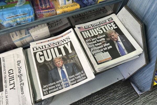 Newspapers are on display at a bodega in the Brooklyn borough of New York a day after a New York jury found former President Donald Trump guilty of 34 felony charges, on Friday, May 31, 2024.  (AP Photo/Ruth Brown)