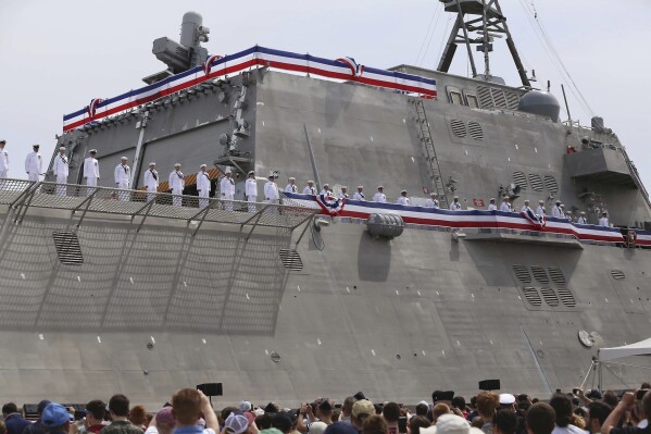 FILE - Thousands attend the commissioning ceremony for the USS Manchester at the New Hampshire State Pier in Portsmouth, N.H.,on Saturday, May 26, 2018. (Ioanna Raptis/Portsmouth Herald via AP)