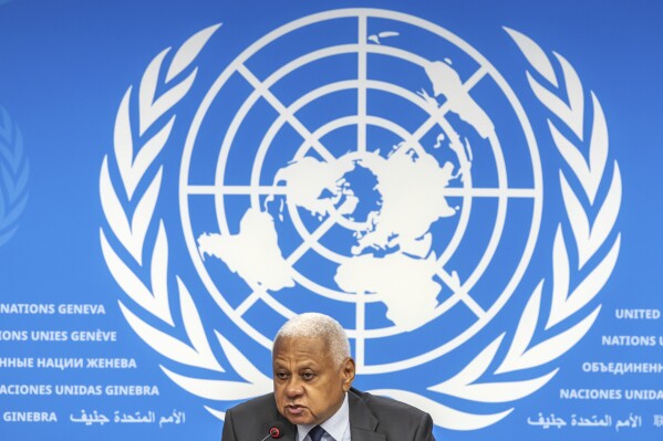 Mohamed Chande Othman, chair of the of the United Nations Fact-Finding Mission, presents its first investigative report to the media during a press conference at the European headquarters of the United Nations in Geneva, Switzerland, Friday, Sept. 6, 2024. (Salvatore Di Nolfi/Keystone via AP)