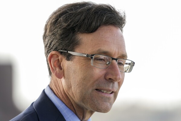 FILE - Washington Attorney General Bob Ferguson arrives for a bill signing on April 27, 2023, at the University of Washington's Hans Rosling Center for Population Health in Seattle. A Washington state judge said Friday, July 12, 2024 that Ferguson is not entitled to enforce a subpoena seeking decades of records from the Seattle Archdiocese, despite his assertion that the records are needed to learn whether the Catholic church used charitable trust funds to cover up sexual abuse by priests. (AP Photo/Lindsey Wasson, File)