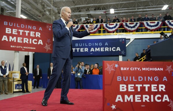 FILE - President Joe Biden speaks about manufacturing jobs and the economy at SK Siltron CSS, a computer chip factory in Bay City, Mich., Nov. 29, 2022. In the ensuing two years following the pandemic, as inflation slowed but persisted, the confidence Biden hoped to instill steadily waned. And when he showed his age in a disastrous debate in June against Donald Trump, he lost the benefit of the doubt as well. That gave him the legacy of having built the legislative scaffolding of a renewed America without convincing voters that better days were ahead. (AP Photo/Patrick Semansky, File)