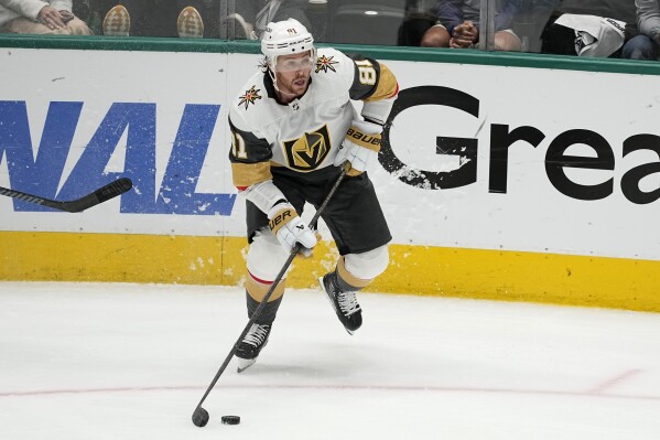 FILE - Vegas Golden Knights' Jonathan Marchessault controls the puck in Game 5 of an NHL hockey Stanley Cup first-round playoff series against the Dallas Stars in Dallas, May 1, 2024. Hundreds of millions of dollars will be committed to free agents, including a strong crop of forwards led by longtime Tampa Bay captain Steven Stamkos, three-time Stanley Cup champion Patrick Kane and 2023 playoff MVP Marchessault. (AP Photo/Tony Gutierrez, File)