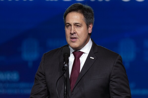 FILE - Paul Dans, director of Project 2025 at the Heritage Foundation, speaks at the National Religious Broadcasters convention, Feb. 22, 2024. (AP Photo/George Walker IV, File)