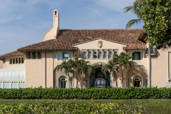 FILE - In this Monday, Jan. 18, 2021, file photo, is Mar-a-Lago in Palm Beach, Fla. Former President Donald Trump has been living at his Mar-a-Lago club since leaving office last week — a possible violation of a 1993 agreement he made with the Town of Palm Beach that limits stays to seven consecutive days. Town Manager Kirk Blouin said in a brief email Thursday, Jan. 28, that Palm Beach is examining its options and the matter might be discussed at the town council's February meeting.  (Greg Lovett/The Palm Beach Post via AP, File)