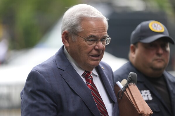 Sen. Bob Menendez, D-N.J., enters federal court in New York, Friday, July 12, 2024. (AP Photo/Pamela Smith)