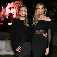 Erin Foster and Sara Foster stand together at a screening for 'Nobody Wants This'