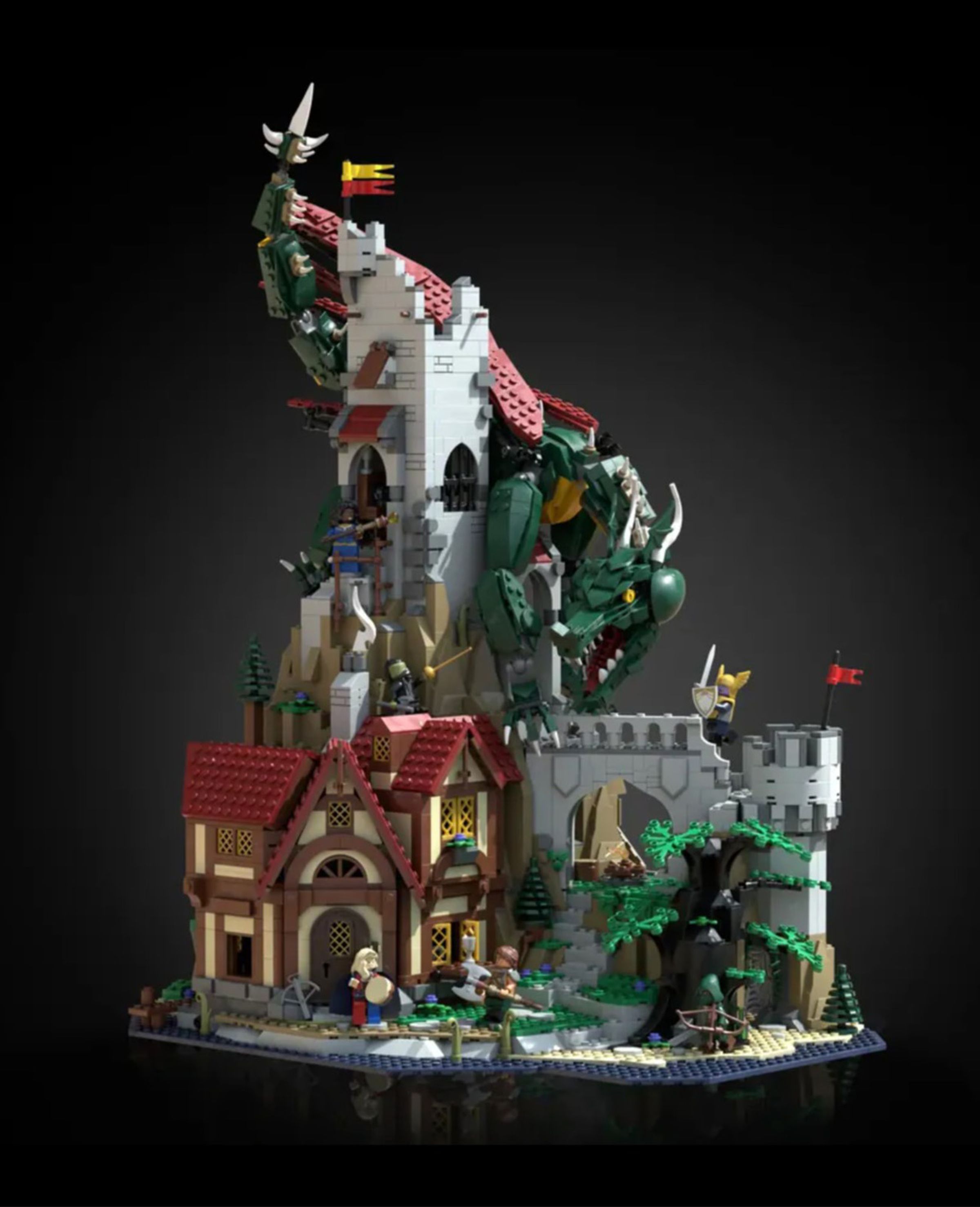 A lego structure of a tower and tavern with a green dragon