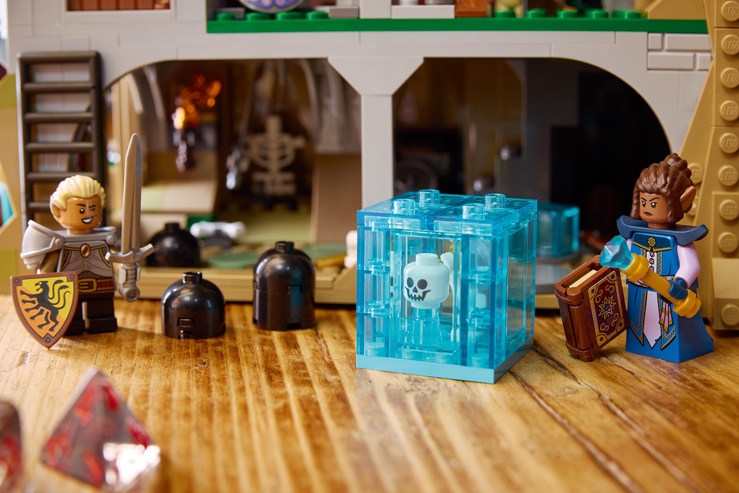 Two lego d&amp;d figurines fighting a gelatinous cube.