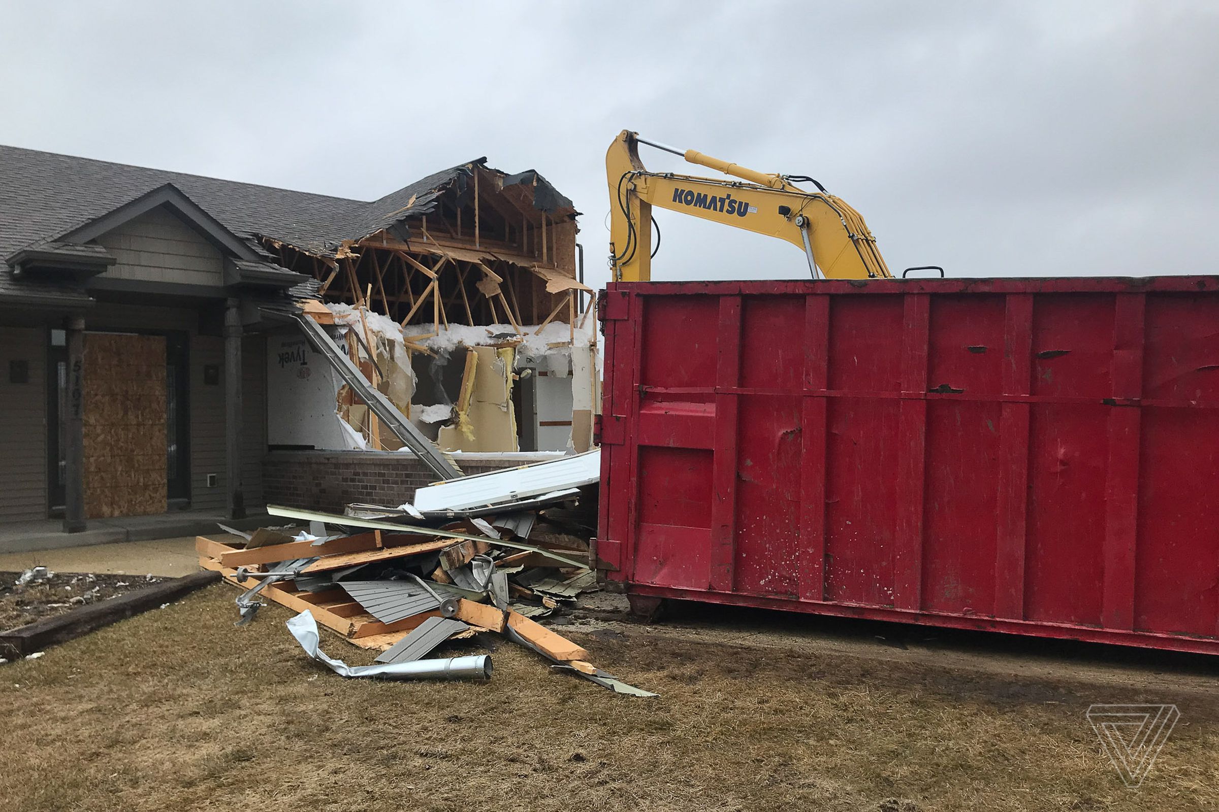 Demolition of the house next to the Mahoneys. It was the only other home remaining in the primary factory zone.