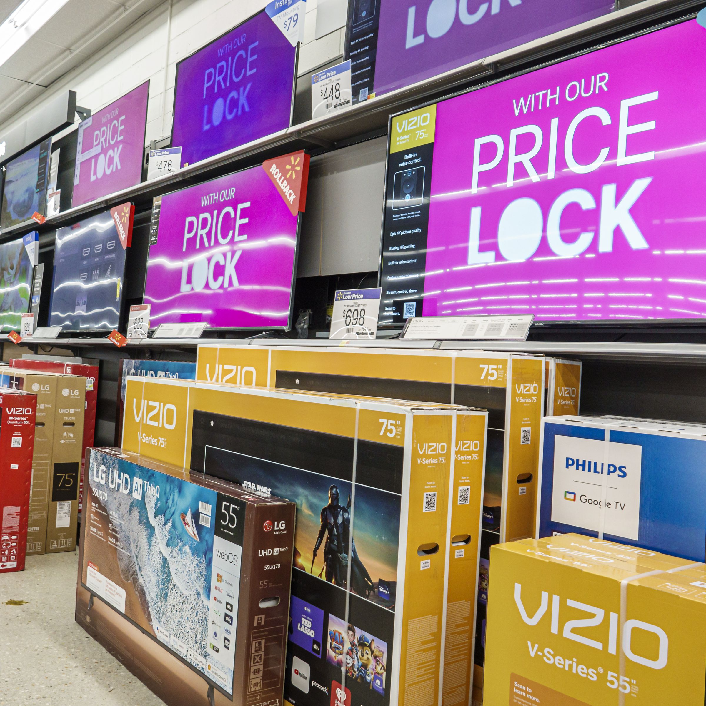 A photo showing the TV aisle at Walmart