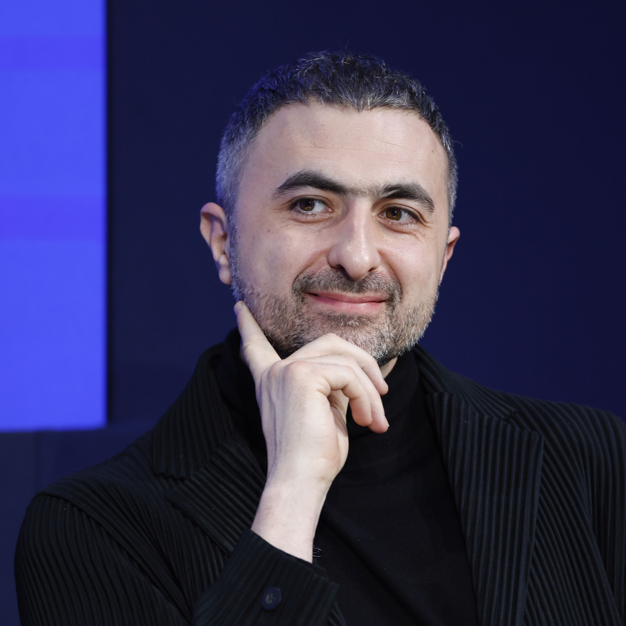 A photo showing Mustafa Suleyman during the World Economic Forum 2024