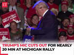 Donald Trump battles microphone in Michigan rally:Image