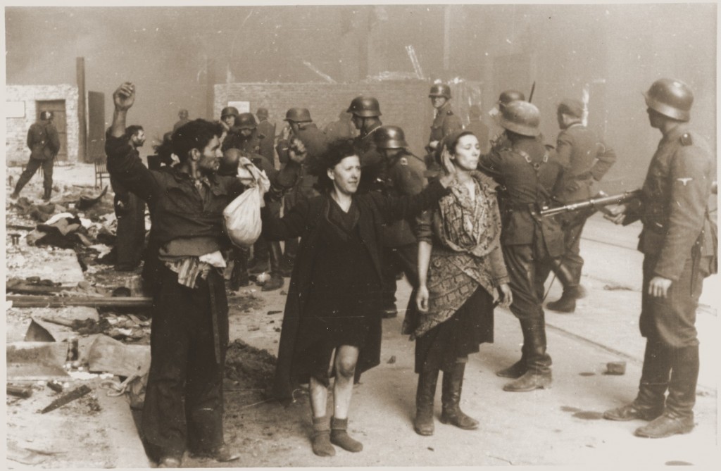 Jewish resistance fighters captured by SS troops during the Warsaw ghetto uprising. [LCID: 46193]