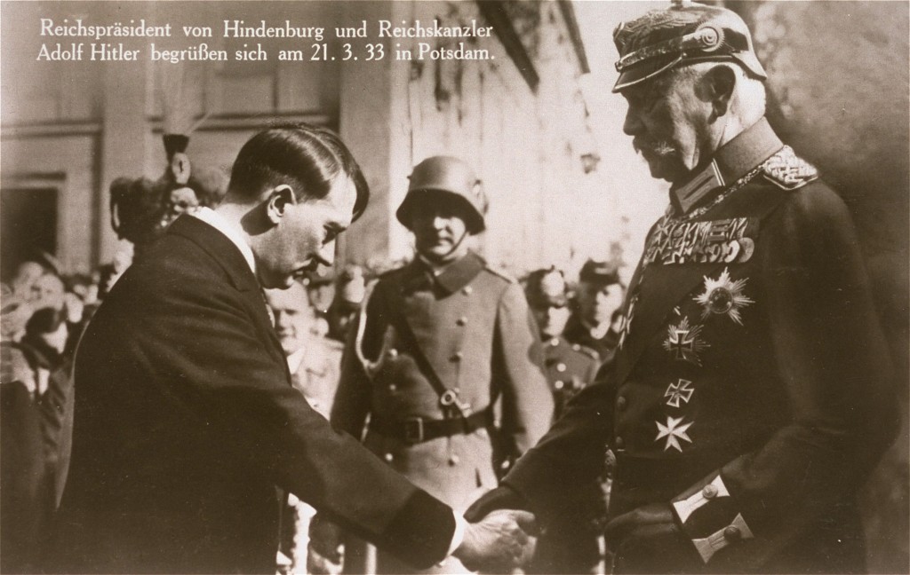 Recently appointed as German chancellor, Adolf Hitler greets President Paul von Hindenburg in Potsdam, Germany, on March 21, 1933.