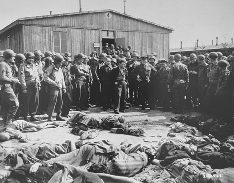 While on a tour of the newly liberated concentration camp, General Dwight Eisenhower and other high-ranking US Army officers view the bodies of prisoners who were killed during the evacuation of Ohrdruf. Ohrdruf, Germany April 12, 1945.