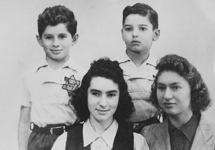 The Margules children wearing Jewish badges. Originally from Warsaw, the Margules family settled in Paris in the 1930s.