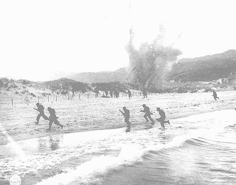 British troops land on the beaches of Normandy on D-Day, the beginning of the Allied invasion of France to establish a second front ...