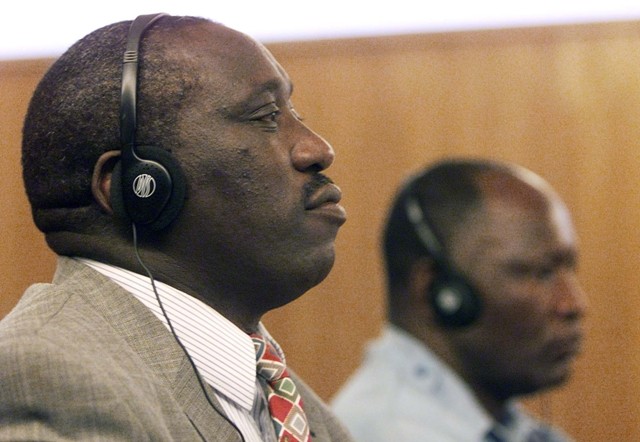 Singer Simon Bikindi sits at the International Criminal Tribunal for Rwanda during his trial for incitement to genocide.