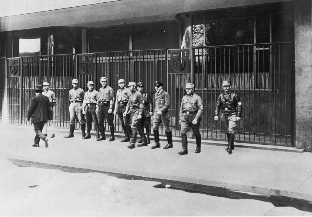 Nazi Storm Troopers (SA) block the entrance to a trade union building that they have occupied.