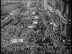 On November 9, 1938, the Nazis led a nationwide pogrom against Jews. During the pogrom, known as "Kristallnacht" (the "Night of Broken Glass"), bands of Storm Troopers (SA) destroyed thousands of Jewish-owned businesses and hundreds of synagogues. Almost 100 Jews were killed in the process. This footage shows scenes from a protest rally in New York City. Rabbi Stephen S. Wise voiced the outrage of the American Jewish community. As part of an official protest by the United States government against the violence, President Franklin D. Roosevelt recalled America's ambassador from Germany.