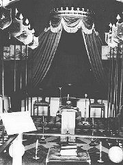 A reconstruction of a Masonic lodge from the Isle of Jersey, on display in an anti-Masonic exhibition in Nuremberg. Germany, 1938.