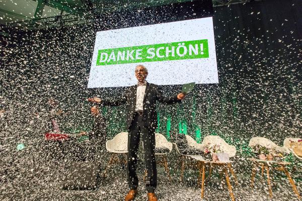 Man celebrating during a EU Green Capital & EU Green Leaf Award Ceremony