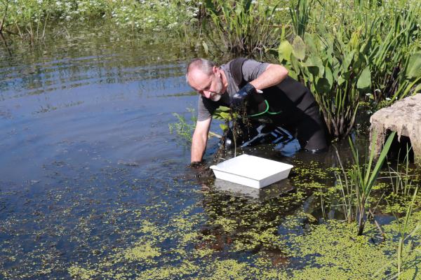 A man takes water samples