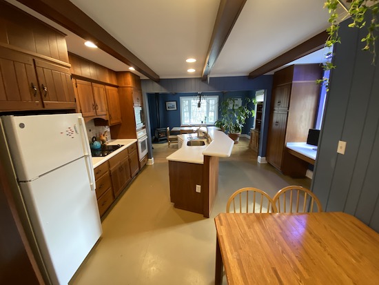 A blue painted country looking kitchen