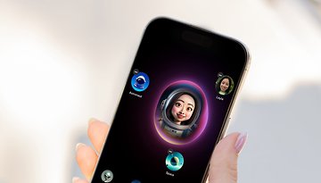 A person holds a smartphone displaying animated characters and a user profile named Layla.