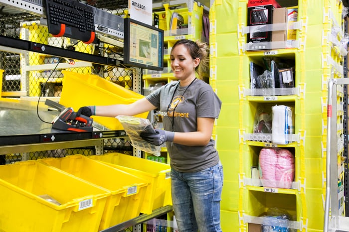 A woman working in one of Amazon's warehouses.