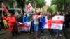 FILe - Demonstrators rally against the "foreign influence" bill in Tbilisi, Georgia, May 14, 2024. Because of the law, the U.S. announced on July 31, 2024, that it would withhold $95 million in assistance to the country. 