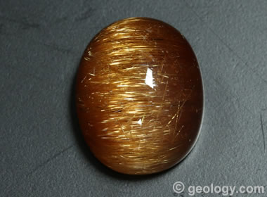 Rutilated quartz cabochon