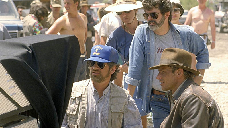 Spielberg on set with George Lucas, Kathleen Kennedy, and Harrison Ford for The Last Crusade.