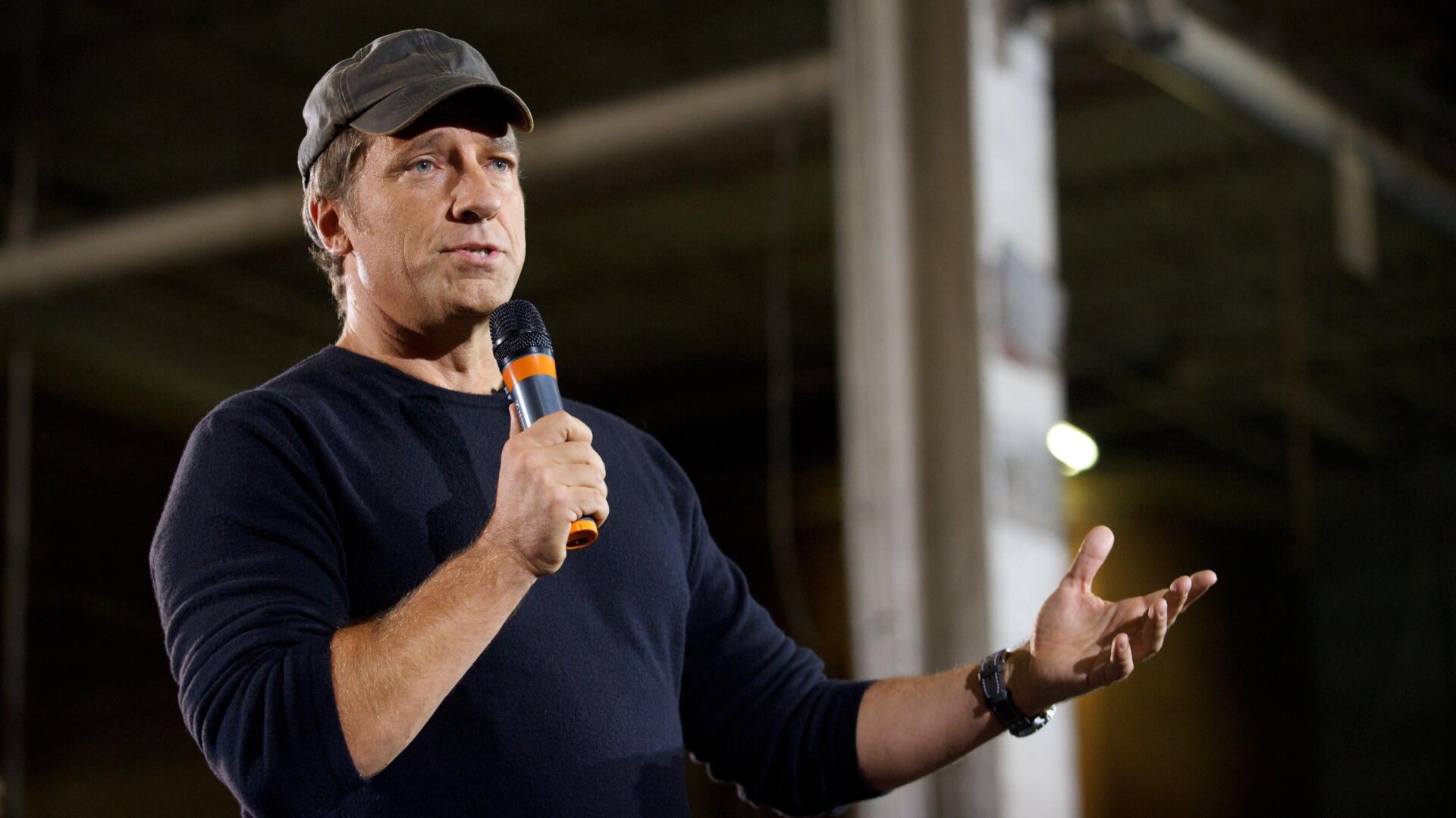 Mike Rowe takes part in a roundtable discussion on manufacturing with Republican presidential candidate Mitt Romney in 2012.