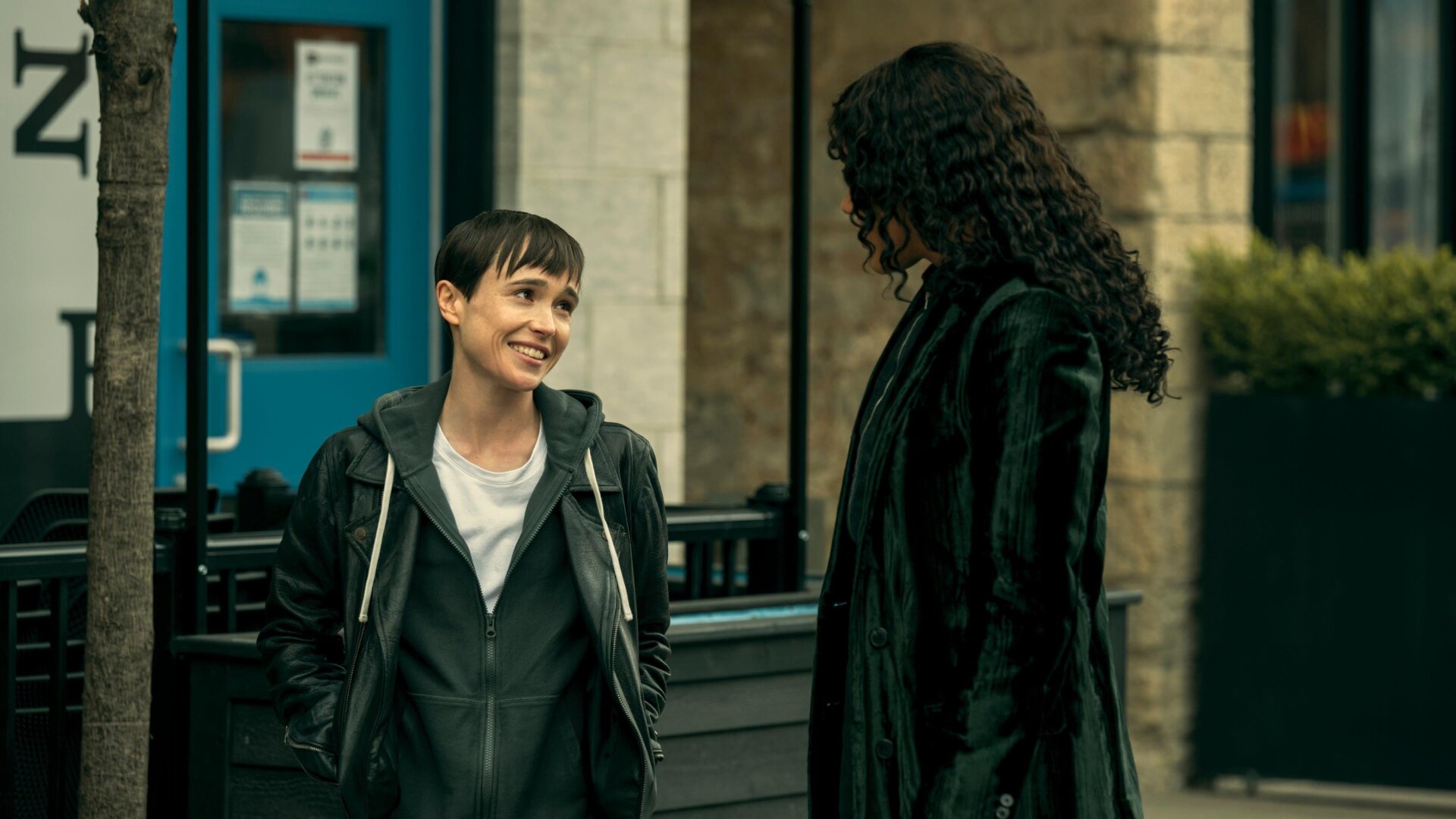 Viktor (Elliot Page) and Allison (Emmy Raver-Lampman) share a smile in season three of The Umbrella Academy.