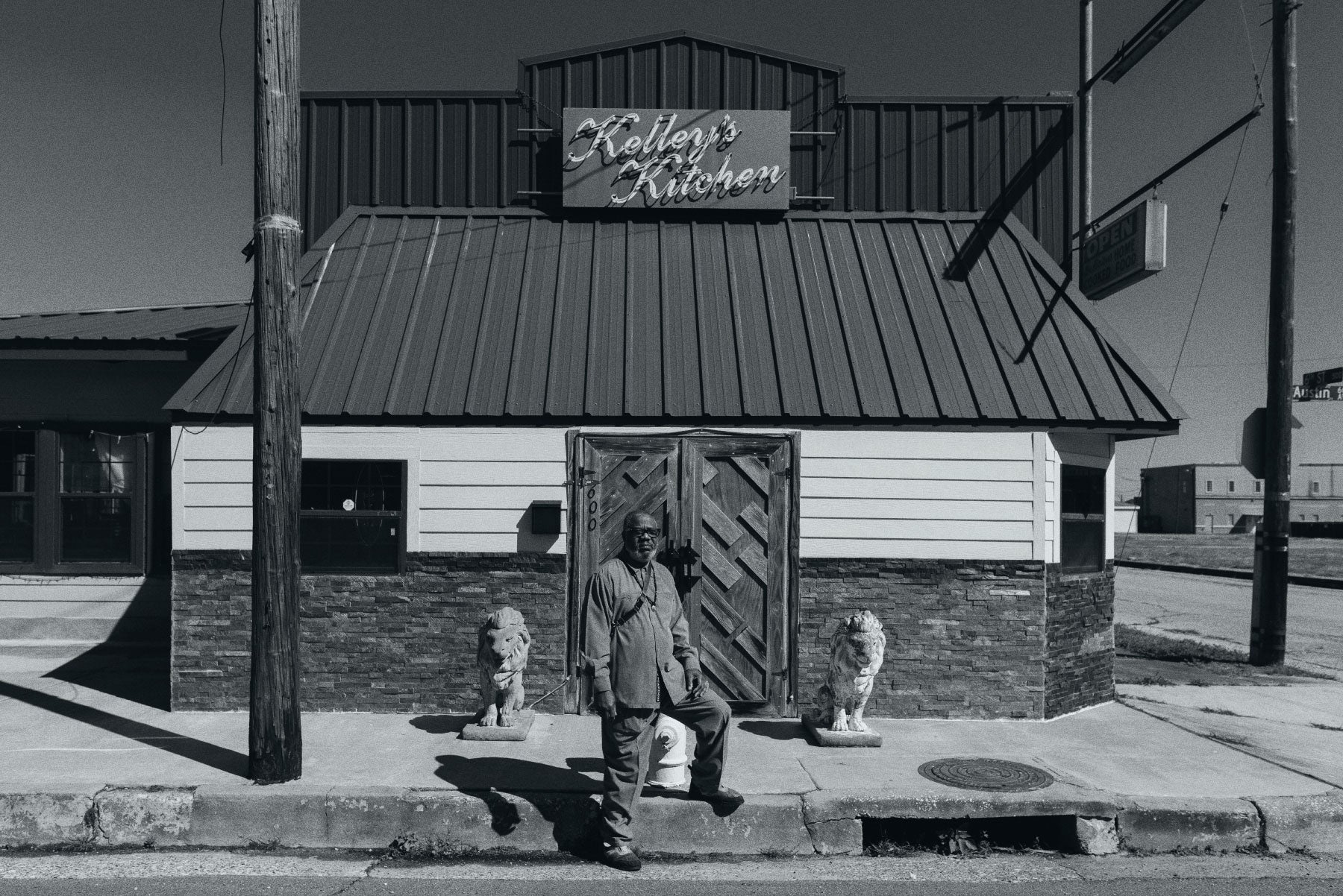 Local environmentalist and business owner Hilton Kelley stands in front of his restaurant in Port Arthur.