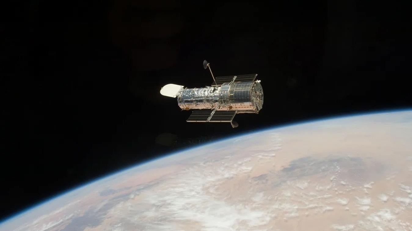 The Hubble Space Telescope as seen from the space shuttle Atlantis (STS-125) in May 2009, during the fifth and final servicing of the observatory.