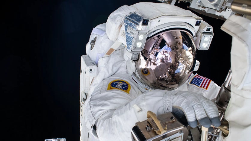 A NASA astronaut pictured outside the ISS during a spacewalk.