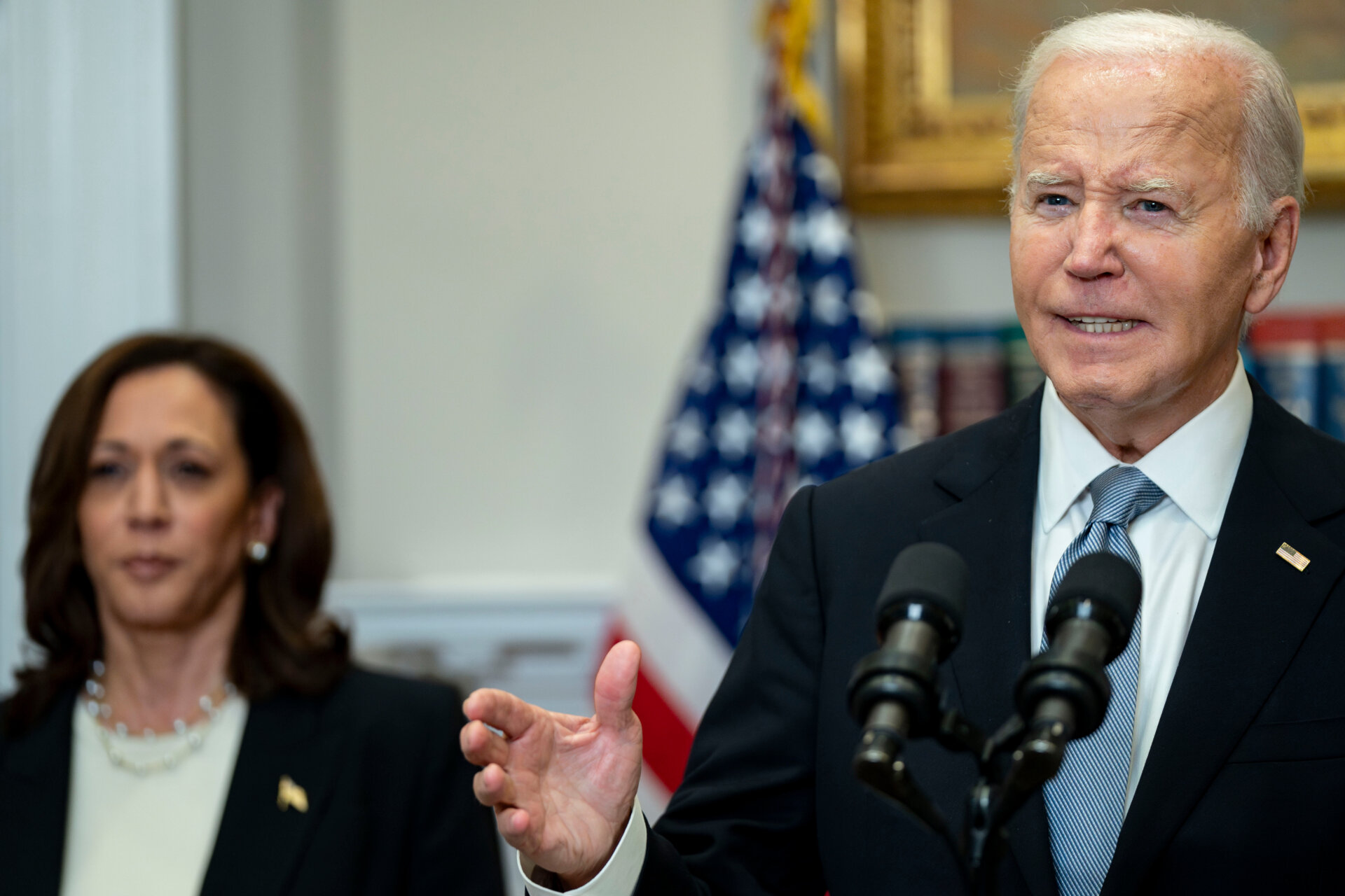 US Vice President Kamala Harris, left, and President Joe Biden