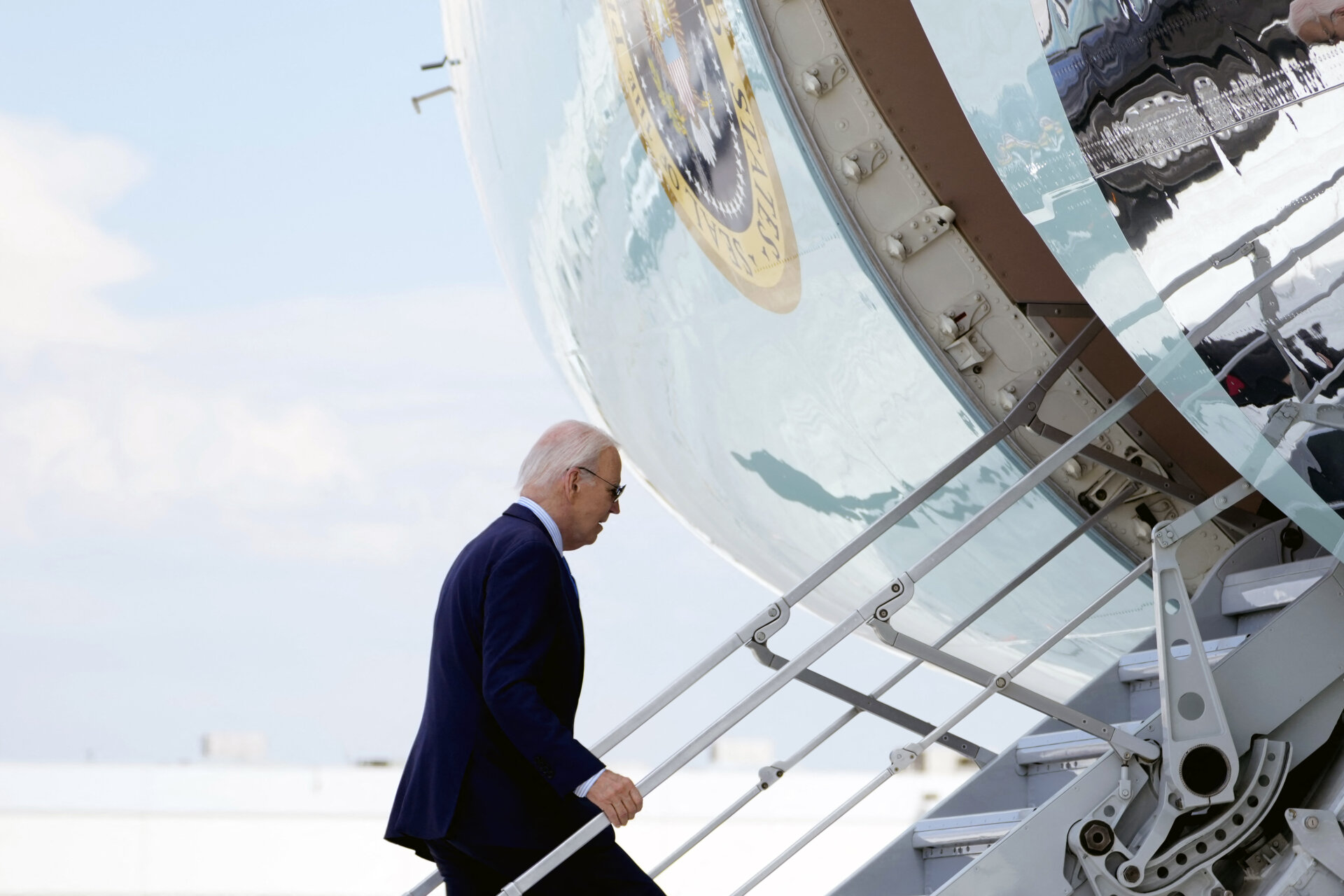 Joe Biden boards Air Force One as he departs Harry Reid International Airport in Las Vegas, Nevada, on July 17, 2024, en route to Delaware.