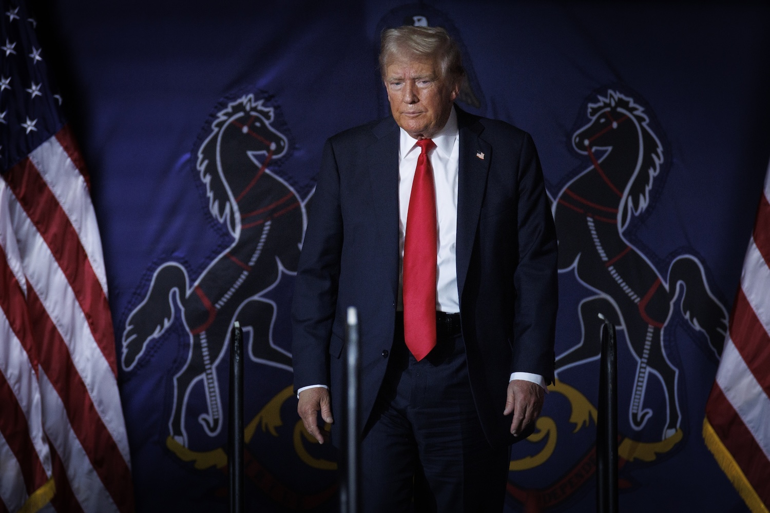 Republican nominee Donald Trump walks on stage during a campaign event at the New Holland Arena in Harrisburg, Pennsylvania.