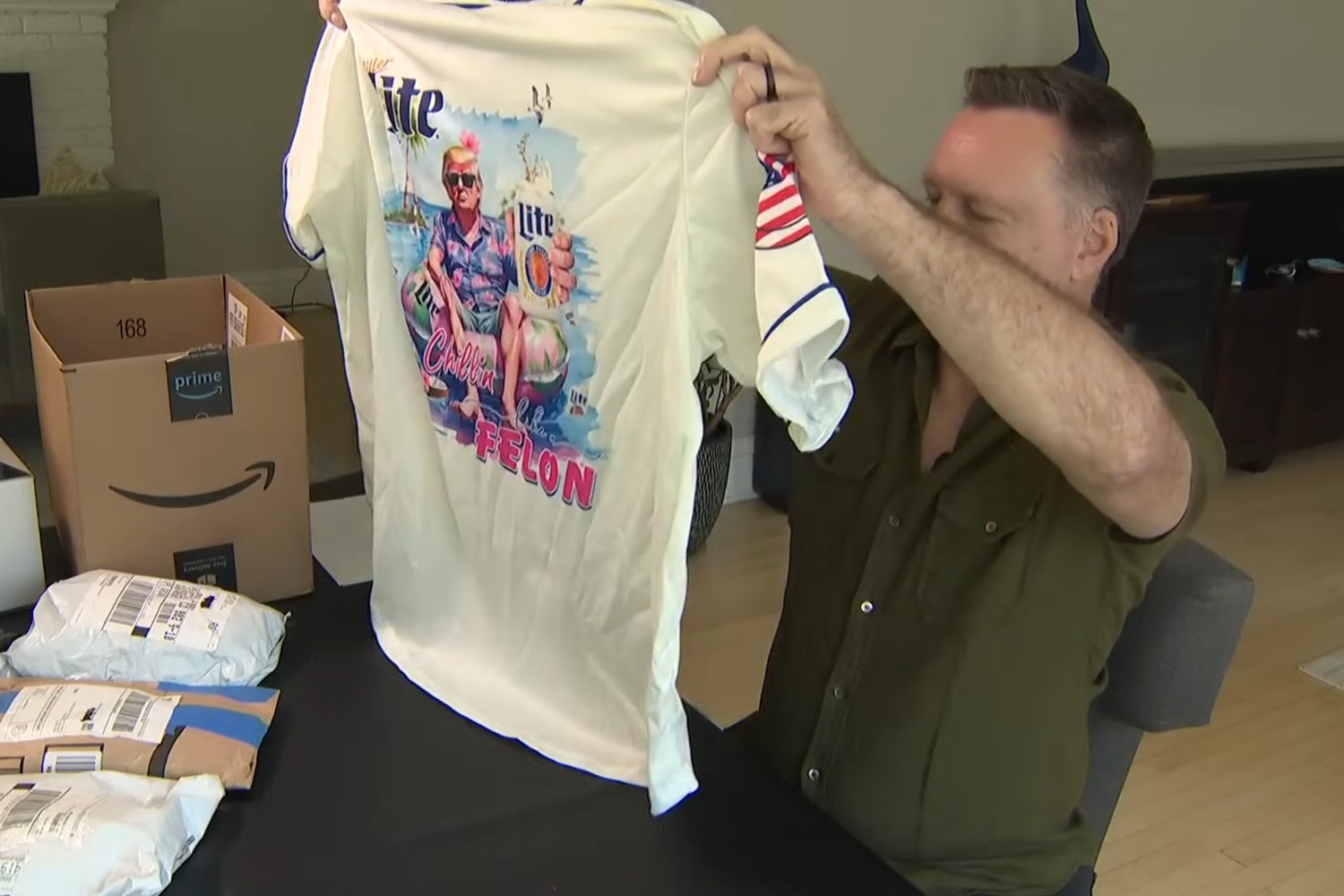 Rick holding up one of the Trump jerseys he's gotten from TikTok.