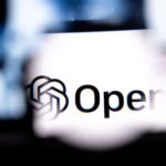 A computer showing OpenAI's logo