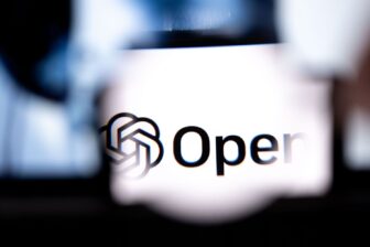 A computer showing OpenAI's logo